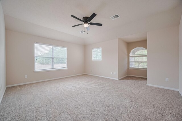 810 Dracena Ct, Richmond, TX 77406 - empty room with healthy amount of natural light, light carpet, a ceiling fan, and baseboards