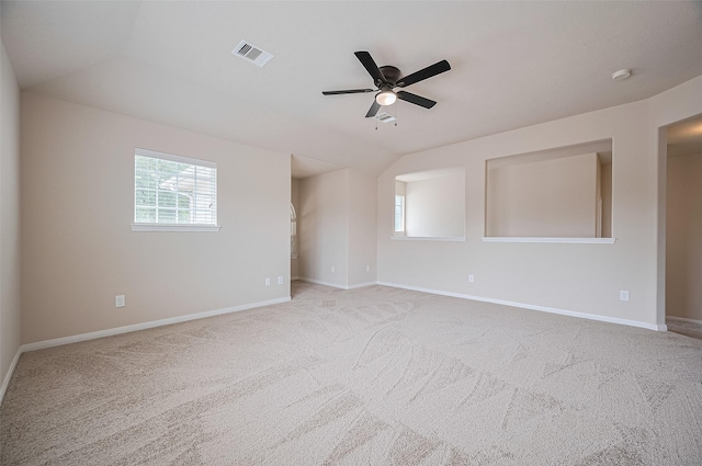 810 Dracena Ct, Richmond, TX 77406 - empty room with a ceiling fan, light carpet, plenty of natural light, lofted ceiling, and baseboards