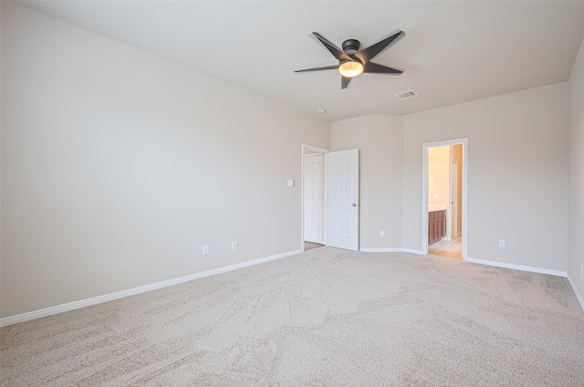 810 Dracena Ct, Richmond, TX 77406 - unfurnished bedroom with baseboards, light carpet, ensuite bathroom, and a ceiling fan
