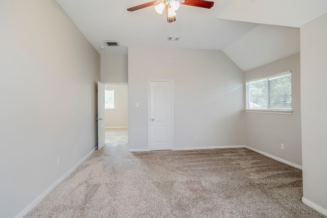 16511 Bluefin St, Crosby, TX 77532 - spare room featuring a ceiling fan, healthy amount of natural light, carpet floors, baseboards, and vaulted ceiling