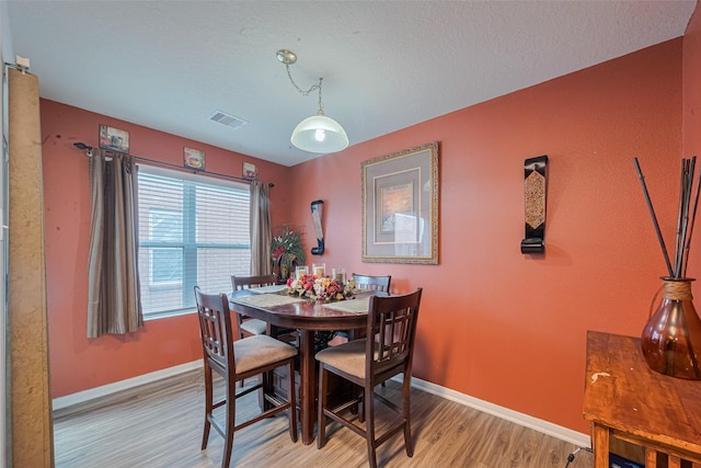 1810 Macondray Dr, Humble, TX 77396 - dining space with light wood finished floors and baseboards
