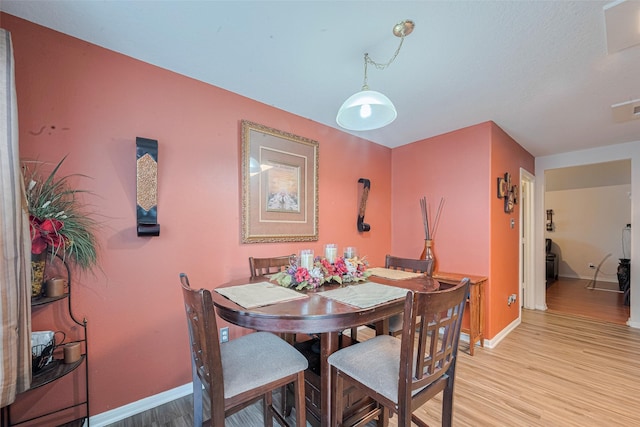 1810 Macondray Dr, Humble, TX 77396 - dining area featuring baseboards and light wood finished floors