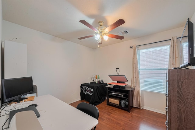 1810 Macondray Dr, Humble, TX 77396 - home office with ceiling fan, baseboards, and wood finished floors