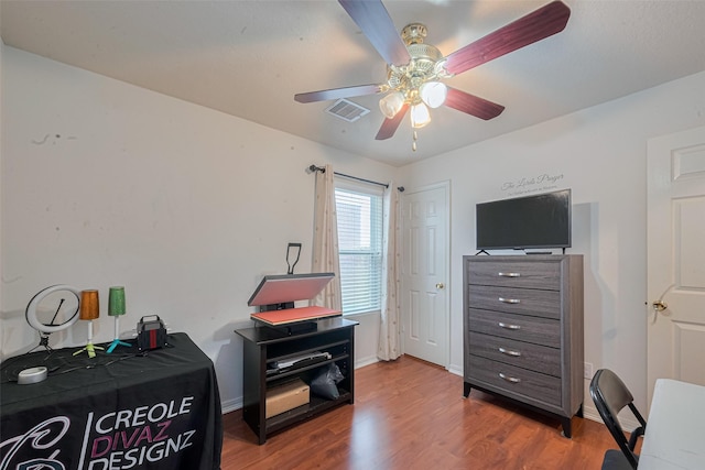 1810 Macondray Dr, Humble, TX 77396 - bedroom featuring wood finished floors, ceiling fan, and baseboards