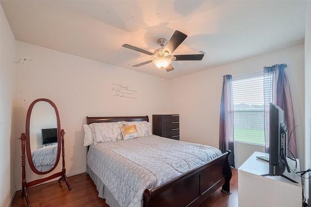 1810 Macondray Dr, Humble, TX 77396 - bedroom with wood finished floors, ceiling fan, and baseboards