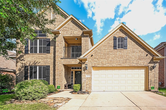 18827 Waverly Springs Ln, Cypress, TX 77429 - view of front of property featuring brick siding, a balcony, and driveway