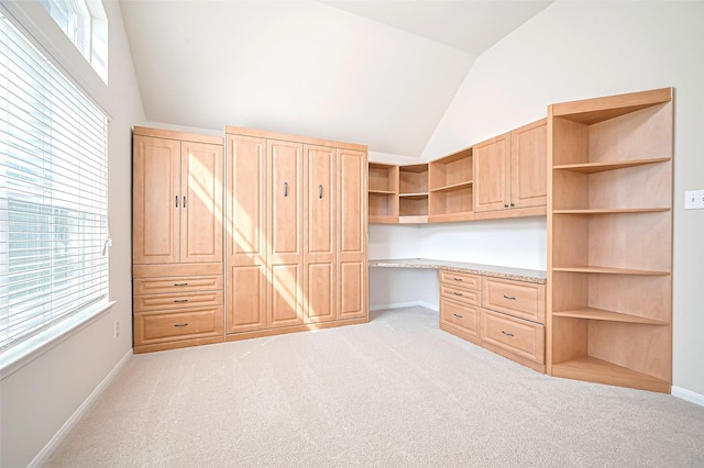 18827 Waverly Springs Ln, Cypress, TX 77429 - unfurnished office with lofted ceiling, built in desk, light colored carpet, and baseboards