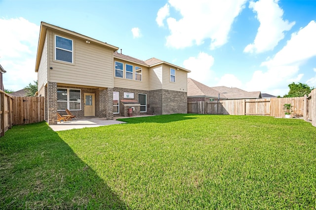 18827 Waverly Springs Ln, Cypress, TX 77429 - back of house with brick siding and a patio