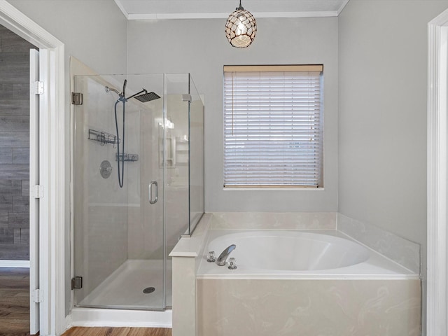 3910 Echo Mountain Dr, Kingwood, TX 77345 - full bath featuring a bath, a shower stall, and crown molding