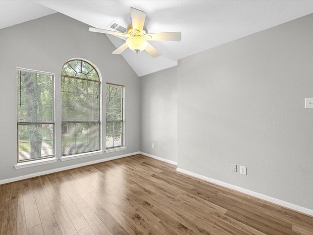 3910 Echo Mountain Dr, Kingwood, TX 77345 - unfurnished room with lofted ceiling, wood finished floors, ceiling fan, and baseboards