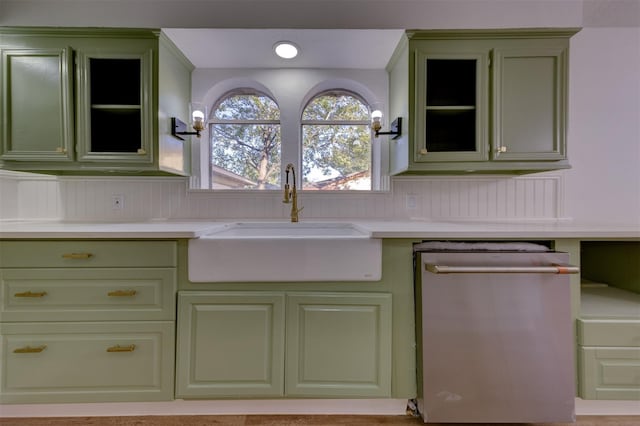 127 Red Bud Ln, Baytown, TX 77520 - kitchen featuring green cabinets, dishwasher, a sink, open shelves, and light countertops