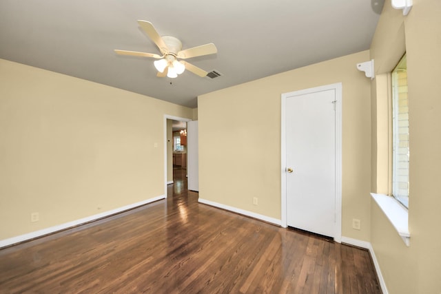 149 E Riverwood Dr, Houston, TX 77076 - unfurnished bedroom featuring wood finished floors, baseboards, and ceiling fan