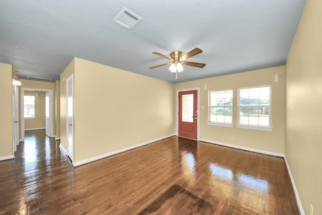 149 E Riverwood Dr, Houston, TX 77076 - entryway with baseboards, a ceiling fan, and wood finished floors