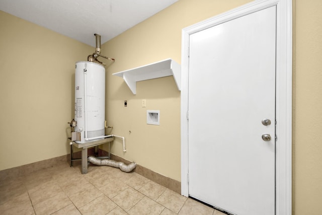 149 E Riverwood Dr, Houston, TX 77076 - laundry room with gas water heater, hookup for an electric dryer, hookup for a washing machine, and light tile patterned floors