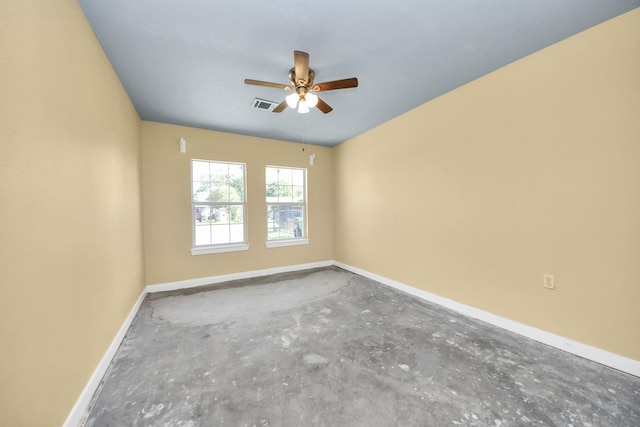 149 E Riverwood Dr, Houston, TX 77076 - unfurnished room featuring concrete flooring, baseboards, and a ceiling fan
