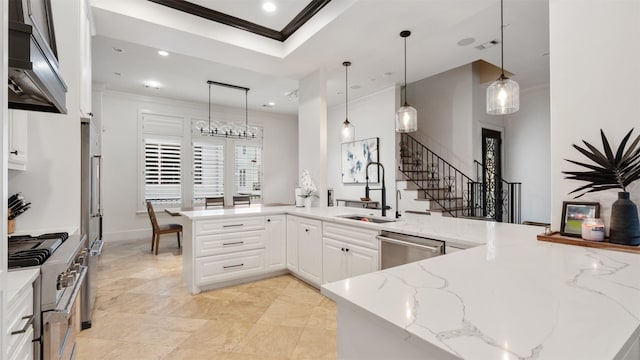 5215 Feagan St Unit A, Houston, TX 77007 - kitchen featuring stainless steel appliances, wall chimney exhaust hood, a sink, crown molding, and white cabinets