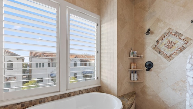 5215 Feagan St Unit A, Houston, TX 77007 - bathroom featuring healthy amount of natural light and a bath