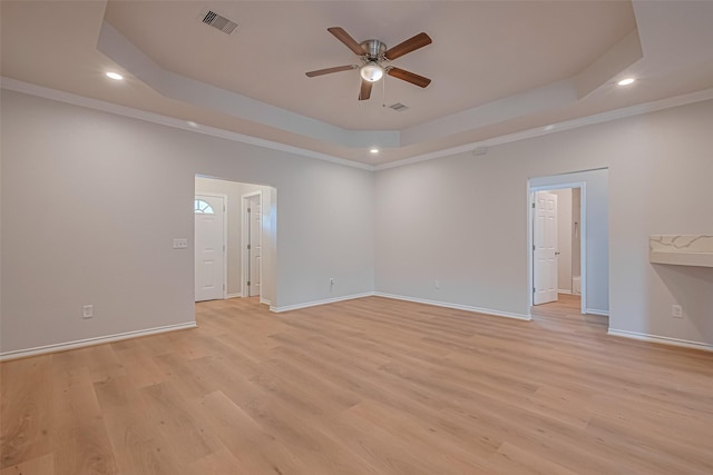 4523 Nexus Rd, Houston, TX 77053 - unfurnished room featuring a tray ceiling, ceiling fan, recessed lighting, light wood-style floors, and baseboards