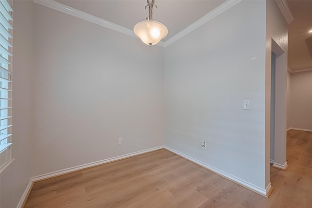 4523 Nexus Rd, Houston, TX 77053 - spare room featuring crown molding, light wood-style floors, and baseboards