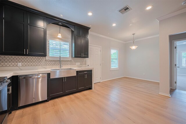 4523 Nexus Rd, Houston, TX 77053 - kitchen featuring dishwasher, a sink, light wood-type flooring, decorative backsplash, and ornamental molding