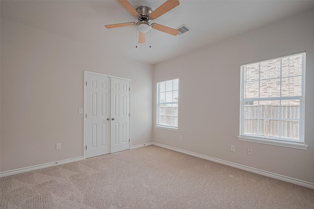 4523 Nexus Rd, Houston, TX 77053 - unfurnished bedroom with light colored carpet, baseboards, and a closet
