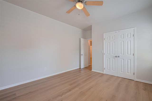 4523 Nexus Rd, Houston, TX 77053 - unfurnished bedroom featuring light wood-style flooring, baseboards, a closet, and a ceiling fan