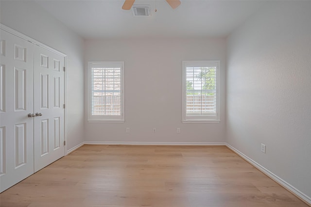 4523 Nexus Rd, Houston, TX 77053 - unfurnished bedroom with light wood finished floors, baseboards, a closet, and ceiling fan