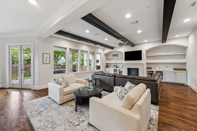 5204 Chestnut St, Bellaire, TX 77401 - living area featuring wood finished floors, a ceiling fan, beam ceiling, recessed lighting, and baseboards
