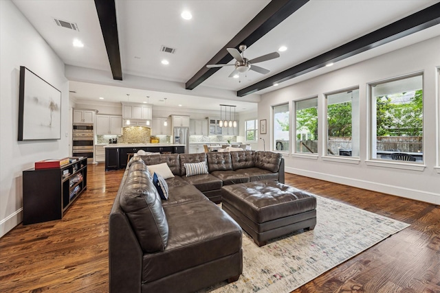 5204 Chestnut St, Bellaire, TX 77401 - living room featuring a ceiling fan, beamed ceiling, baseboards, recessed lighting, and dark wood-type flooring
