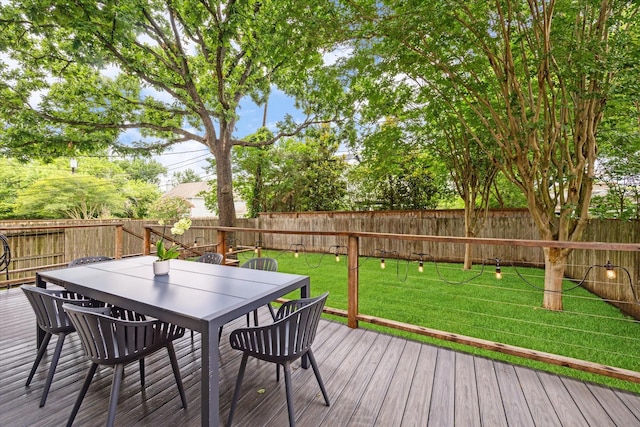 5204 Chestnut St, Bellaire, TX 77401 - wooden terrace with outdoor dining space
