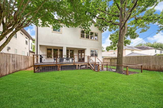 5204 Chestnut St, Bellaire, TX 77401 - rear view of house with a deck and stucco siding