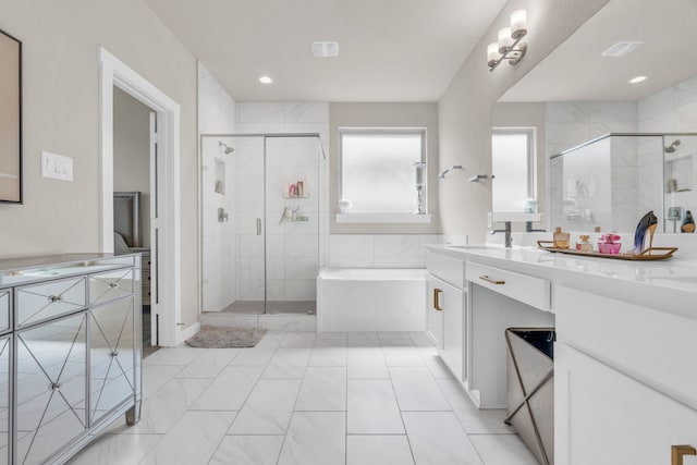 28403 Hannahs Harbor Ln, Katy, TX 77494 - full bath with a bath, vanity, a shower stall, marble look tile flooring, and recessed lighting