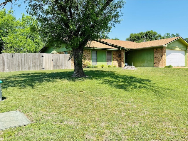 802 Yorktown Dr, Temple, TX 76504 - view of front facade featuring a garage, brick siding, and a gate