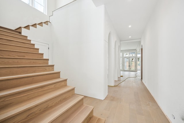 1656 Banks St, Houston, TX 77006 - stairway featuring wood finished floors and recessed lighting