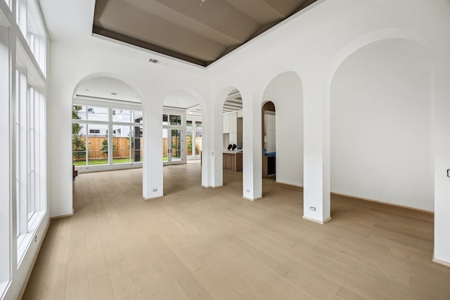 1656 Banks St, Houston, TX 77006 - unfurnished living room with light wood-style floors
