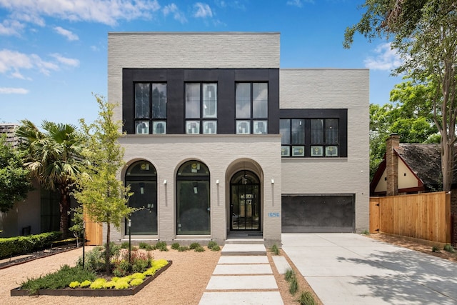 1656 Banks St, Houston, TX 77006 - contemporary home with an attached garage and concrete driveway