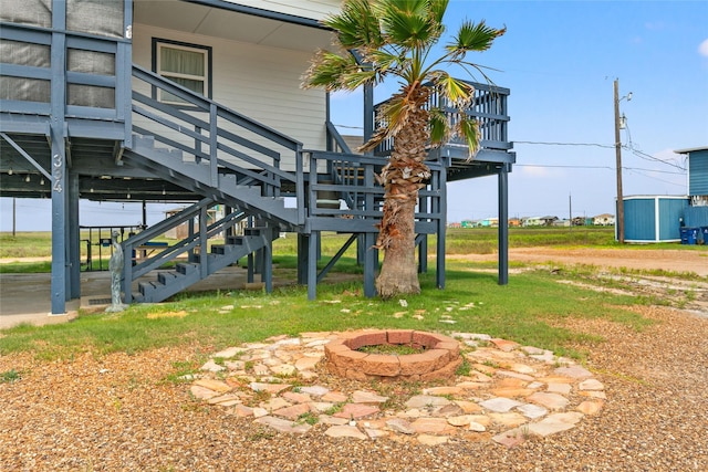 334 Bay Ave, Surfside Beach, TX 77541 - view of yard with an outdoor fire pit