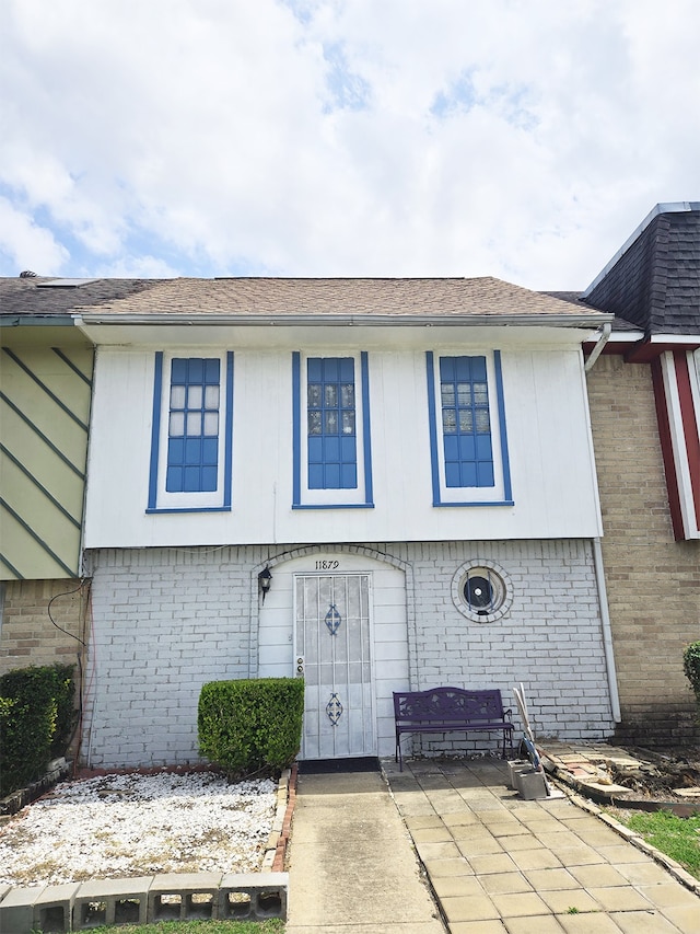11879 Algonquin Dr W, Houston, TX 77089 - view of front of property with brick siding and roof with shingles