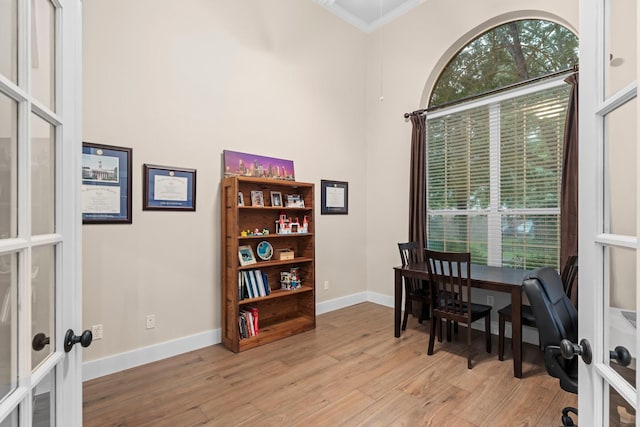 14 Brywood Pl, The Woodlands, TX 77382 - office space featuring french doors, light wood-style flooring, baseboards, and ornamental molding