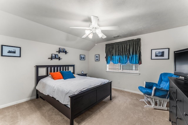 14 Brywood Pl, The Woodlands, TX 77382 - bedroom featuring light carpet, baseboards, vaulted ceiling, and a ceiling fan