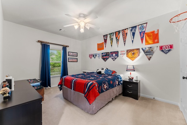 14 Brywood Pl, The Woodlands, TX 77382 - bedroom with light carpet, baseboards, and ceiling fan
