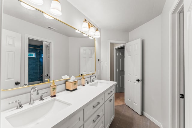 14 Brywood Pl, The Woodlands, TX 77382 - full bathroom featuring double vanity, bathtub / shower combination, and baseboards