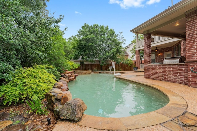 14 Brywood Pl, The Woodlands, TX 77382 - view of pool with a fenced backyard, a grill, and a patio
