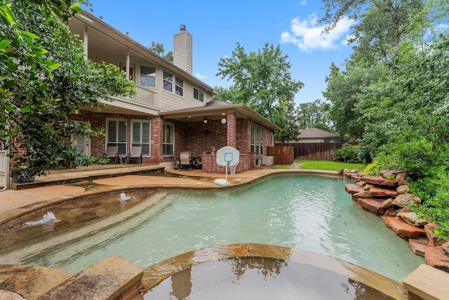 14 Brywood Pl, The Woodlands, TX 77382 - view of swimming pool featuring a patio