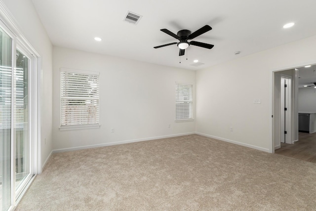 509 W Sixth St, Brenham, TX 77833 - spare room with carpet floors, ceiling fan, recessed lighting, and baseboards
