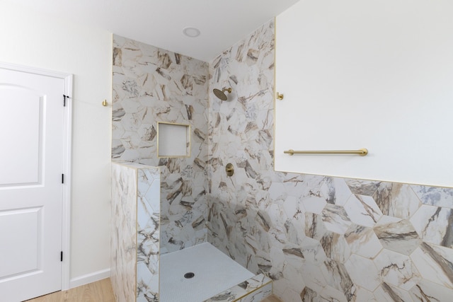 509 W Sixth St, Brenham, TX 77833 - bathroom with a shower stall and wood finished floors