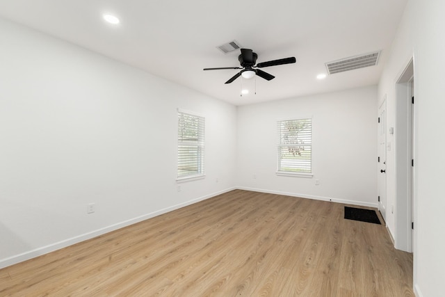 509 W Sixth St, Brenham, TX 77833 - unfurnished room featuring wood finished floors, baseboards, a ceiling fan, and recessed lighting