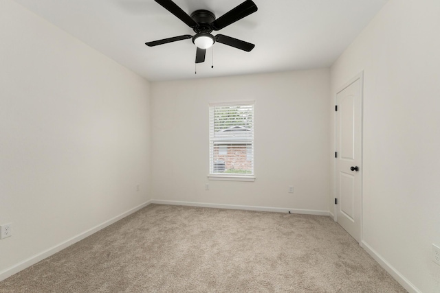 509 W Sixth St, Brenham, TX 77833 - carpeted empty room with a ceiling fan and baseboards