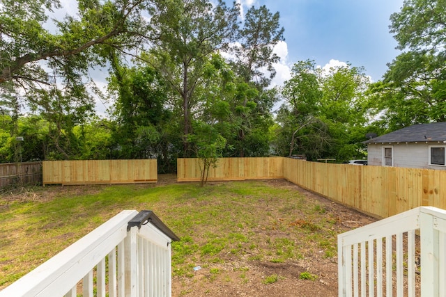 509 W Sixth St, Brenham, TX 77833 - view of yard with view of wooded area