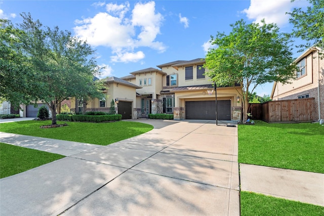3310 Ralston Edge Ln, Houston, TX 77059 - view of front of property featuring stucco siding, driveway, stone siding, and an attached garage